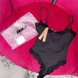 SKIMS Black Lace-Trimmed Bodysuit